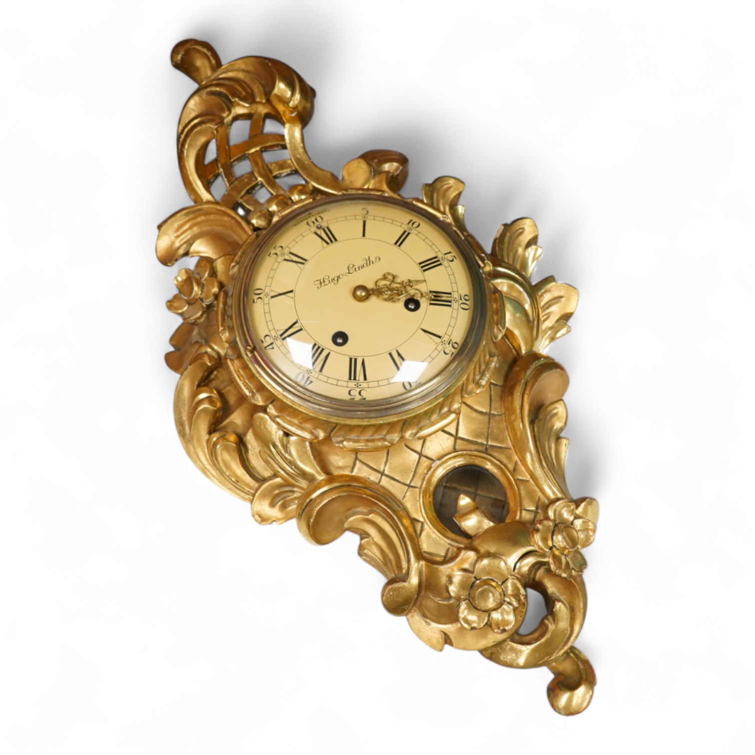 A Swedish giltwood rococo style cartel clock, convex enamel dial signed Hugo Lindh, Westerstrand, with key and pendulum, 56cm high